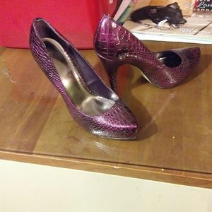 Purple snakeskin high heels